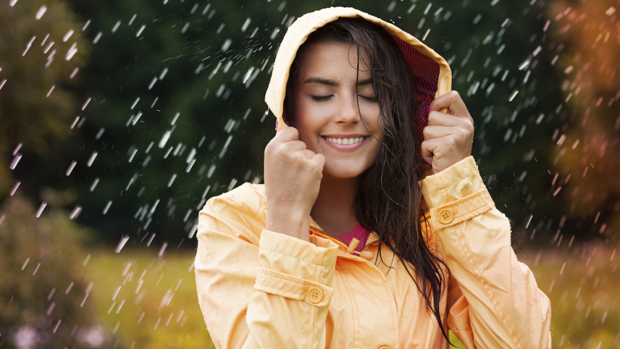 Natural female beauty in autumn rain